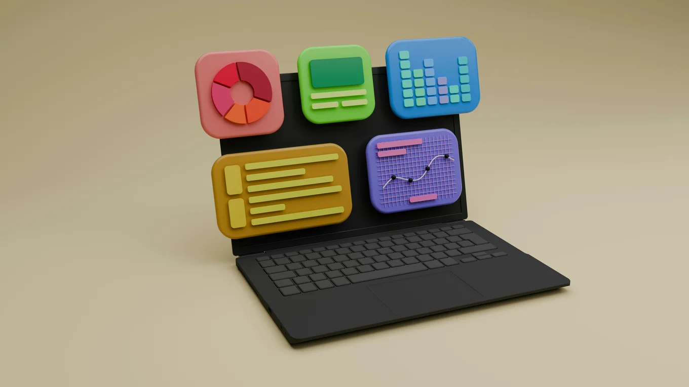 A 3D render of a black laptop with large square icons popping out of the screen, including a red pie-chart-looking diagram, a purple one with a chart, a blue one with smaller squares on it, and a yellow and a green one with a geometric representation of image and text. The background is beige.